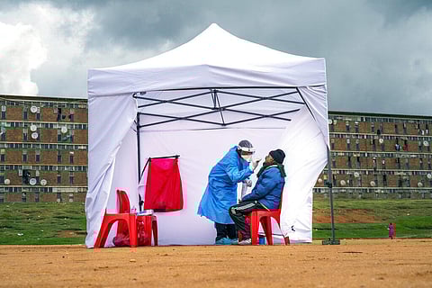 A resident from the Alexandra township gets tested for COVID-19 in Johannesburg. (File photo | AP)