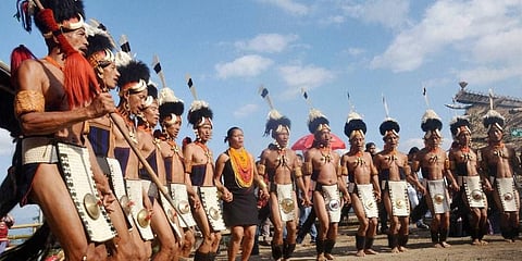 aga tribesmen perform a warrior dance at the opening day of the annual Hornbill Festival at Naga Heritage village Kisama, Nagaland. (File photo | PTI)