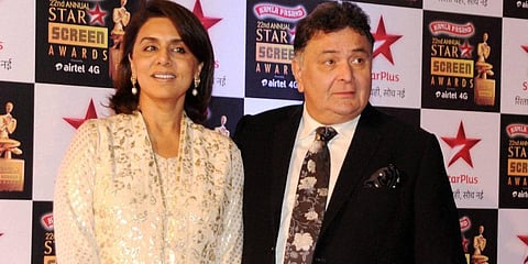 Late Bollywood actor Rishi Kapoor poses with his wife and actress Neetu Singh. (File Photo | PTI)