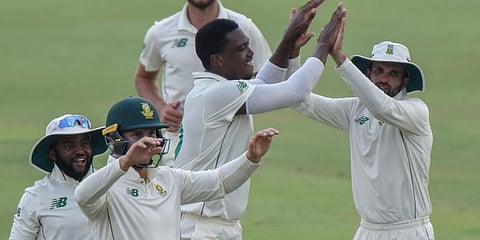 South Africa cricketers celebrate the fall of a wicket during the first Test match against Sri Lanka at SuperSport Park Stadium in Pretoria. (Photo | AP)