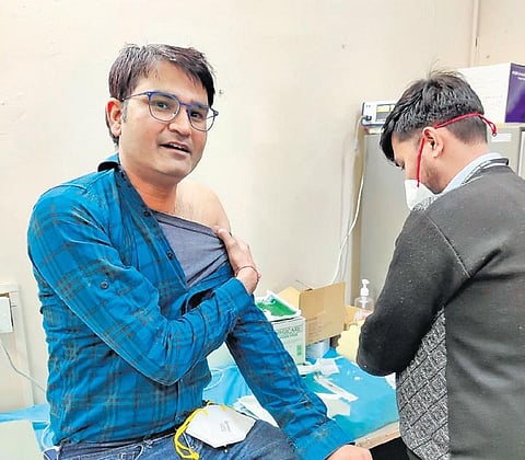 Kanishk, a nursing staff at AIIMS, takes Covaxin shot | Express