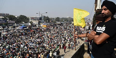 Farmers at the Singhu border during their ongoing Delhi Chalo agitation against Centres new farm laws in New Delhi on Wednesday. (Photo | EPS/Parveen Negi)
