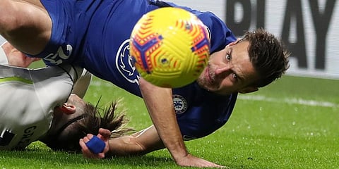 Cesar Azpilicueta, top, and Jack Grealish vie for the ball during the EPL match between Chelsea and Aston Villa in London. (Photo | AP)