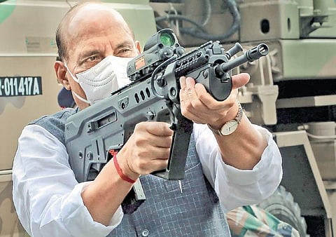 Defence Minister Rajnath Singh inspects a weapon at the Sukna Army Camp. (File | PTI)