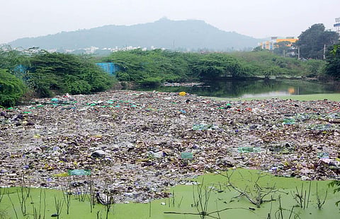 Garbage dumped in the Pallavaram lake ‘Putheri’ in Chennai. (Photo | Ashwin Prasath, EPS)