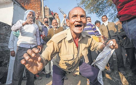 West Pakistani refugees celebrate after casting their votes during the third phase of the DDC elections, at Chak Jafar village in Jammu, on Friday | PTI