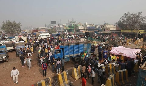 Farmers during a protest against the central government's recent agricultural reforms at the Singhu border in New Delhi on Saturday. (Photo | Shekhar Yadav/EPS)