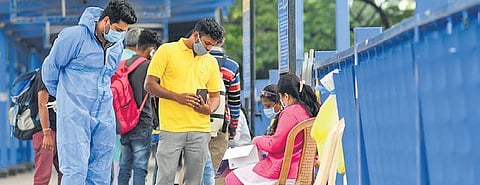 Health workers collect details after swab test near Majestic Bus Station ashishkrishna hp
