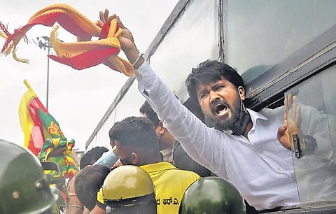 Kannada activists raise slogans against the State Government’s decision to set up the Maratha Development Corporation, in Bengaluru on Satursday | Meghana Sastry