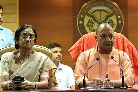 UP Chief Minister Yogi Adityanath (R) and Tourism Minister Rita Bahuguna Joshi (L). (File | PTI)