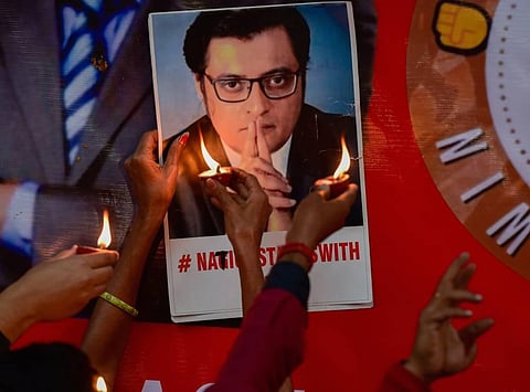 Supporters of Republic TV Editor-In-Chief Arnab Goswami celebrate after the Supreme Court granted him interim bail in the 2018 abetment to suicide case. (Photo | PTI)