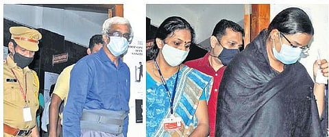 M Sivasankar and Swapna Suresh coming out of the Additional Chief Judicial Magistrate (Economic Offences) Court in Kochi on Monday | A Sanesh