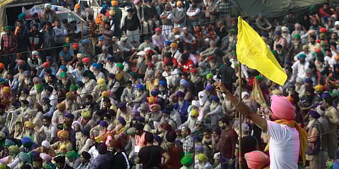Farmers shouting slogans during their Delhi Chalo protest march against the new farm laws at Singhu border in New Delhi on Monday. (Photo| Shekhar Yadav, EPS)