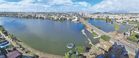 The full-to-the-brim Narayanapuram lake in Pallikaranai, dissected by the Pallavaram -Thoraipakkam radial ring road