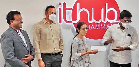 Transport Minister Puvvada Ajay Kumar hands over an appointment letter to a graduate, R Neeradhi, at the Khammam IT Hub on Tuesday