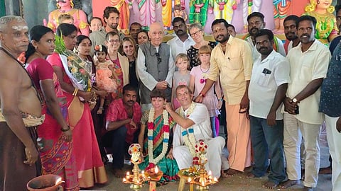 Yann (groom) ties the Thali to Aurore (bride) surrounded by realtives and friends near Vannur in Villupuram | Express