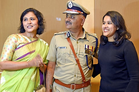 Praveen Sood with his family while taking charge as the new DG and IGP in Bengaluru on Friday. (Photo| Nagaraja Gadekal, EPS)