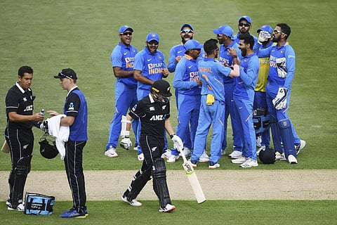 Ravindra Jadeja celebrates with teammates after trapping Tom Latham, third from left, LBW during a One Day International cricket between India and New Zealand. (Photo| AP)