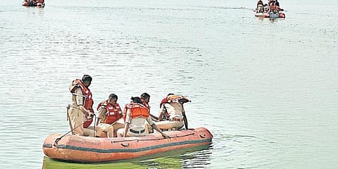 A team of NDRF personnel seen searching for a body in Kalkere Lake, in Bengaluru. (File Photo | Meghana Sastry, EPS)
