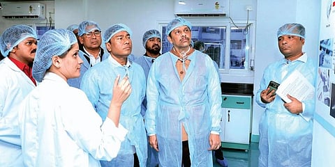 Union Minister Rameswar Teli visits the first microbiology laboratory in Kochi. (Photo | EPS)