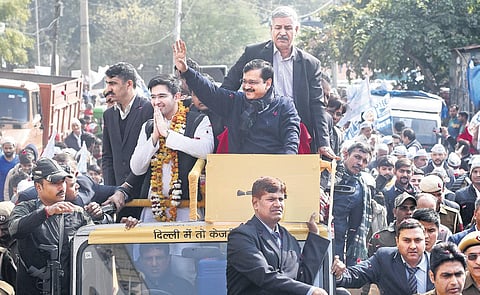 Chief Minister Arvind Kejriwal holds a road show in favour of party nominee Raghav Chaddha in New Delhi. (Photo | Parveen Negi, EPS)