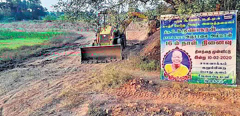 (Anjalai’s rememberance banner placed alongside the lake’s desilting works| Photo- special arrangements)