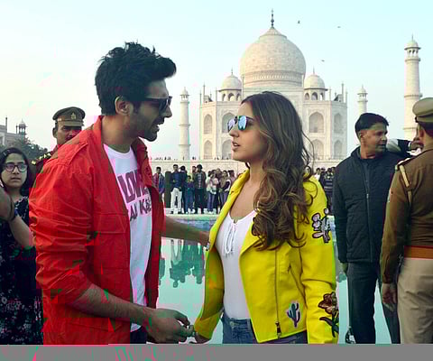 Bollywood actors Sara Ali Khan and Karthik Aryan visits the Taj Mahal during the promotion of their film ‘Love Nowadays’ in Agra on Tuesday. (Photo| ANI)