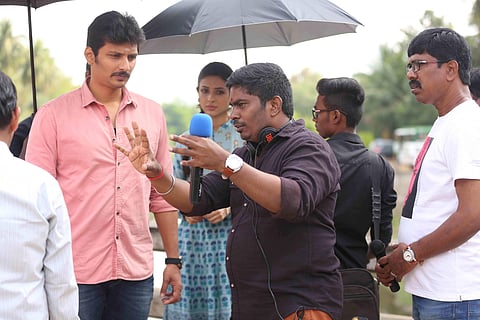 Director Rathina Shiva with Jiiva on the sets of Seeru.