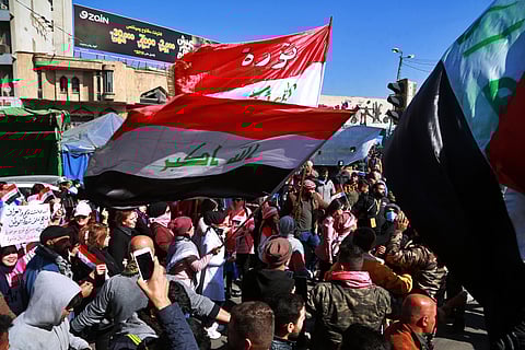 Hundreds of women took to the streets of central Baghdad and southern Iraq on Thursday in defiance of a radical cleric's calls for gender segregation in anti-government protest sites. (Photo | AP)