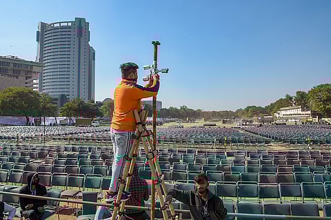 A worker installs CCTV cameras at Ramlila Maidan ahead of the oath-taking ceremony of Aam Aadmi Party AAP 's government in New Delhi Friday Feb. 14 2020. (Photo | PTI)