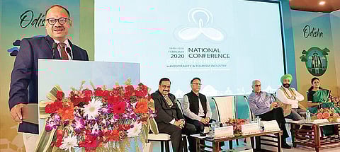 Tourism and Culture Minister Jyoti Prakash Panigrahi addressing the national conference at Institute of Hotel Management in Bhubaneswar on Friday. (Photo | Irfana)