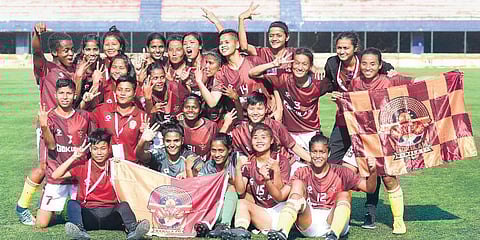Gokulam Kerala FC players rejoice after clinching the Indian Women’s League in Bengaluru on Friday. (Photo | Vinod Kumar T)