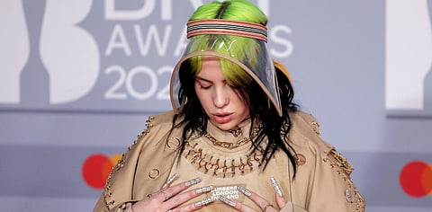 Billie Eilish poses for photographers upon arrival at Brit Awards 2020 in London. (Photo | AP)