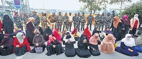 After a person allegedly opened fire in Shaheen Bagh, women protesters gathered to pray at the spot where the incident took place | SHEKHAR YADAV