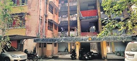 A worn-out building in one of the city police quarters complexes
