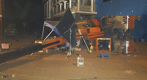 A crane lies sideways after it crashed on the sets of actor Kamal Haasan's upcoming film Indian 2 in Chennai. (Photo| PTI)