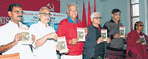 Left party leaders K Narayana and B Raghavulu at the Red Book Day programme organised at the CPI office in New Delhi on Friday
