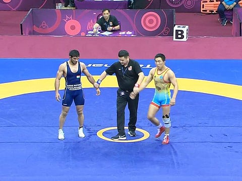 Jitender Kumar gets silver after going down 1-3 to Kazakhstan's Daniyar Kaisanov in 74kg final. (Photo | Twitter)