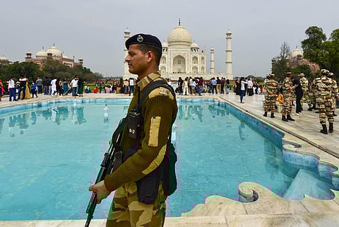 Security Forces patrol the premises of Taj Mahal ahead of US President Donald Trump s maiden visit to India in Agra Sunday. (Photo | PTI)