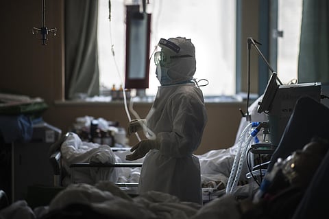 A nurse works at an ICU ward specialised for patients infected by coronavirus in Wuhan in central China's Hubei Province. (Photo | AFP)