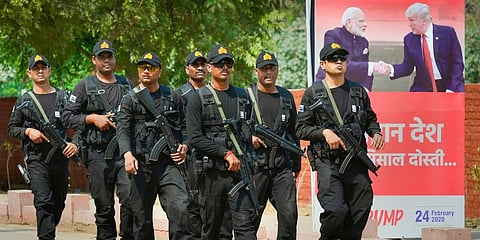 Police commandoes patrol a street near the Taj Mahal ahead of US President Donald Trump's visit in Agra. (Photo| PTI)