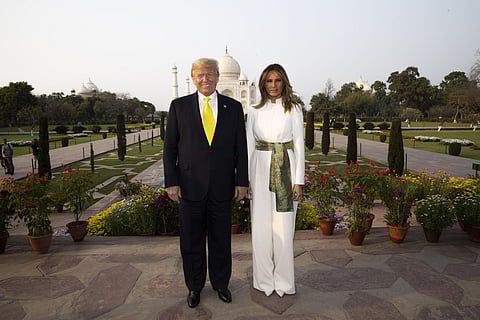 US President Donald Trump with first lady Melania Trump pause as they tour the Taj Mahal. (Photo | AP)