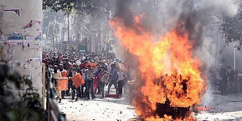 Protesters during clashes between a group of anti and pro-CAA supporters at Jafrabad in north-east Delhi on Monday. (Photo| Parveen Negi, EPS)