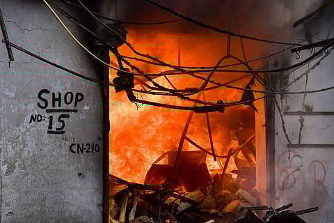 A shop set ablaze by miscreants following clashes over the new citizenship law, in Gokulpuri area of northeast Delhi. (Photo | PTI)