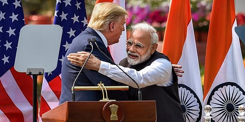 PM Narendra Modi (R) and US President Donald Trump exchange greetings after their joint press statement at the Hyderabad House in New Delhi. (Photo| PTI)