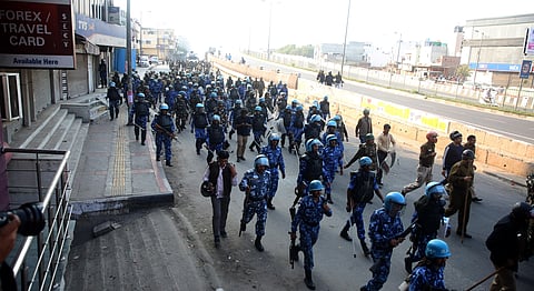 Security personnel conduct flag march during clashes between those against and those supporting the Citizenship Amendment Act in north east Delhi. (Photo | Shekhar Yadav, EPS)