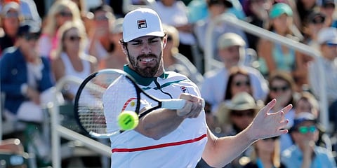 Reilly Opelka returns to Yoshihito Nishioka, of Japan, during the Delray Beach Open singles final tennis match in Delray Beach, Fla. (Photo | AP)