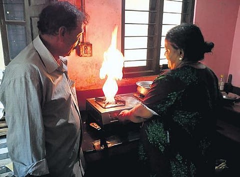 Rathnamma lights the gas stove connected to the borewell | Express