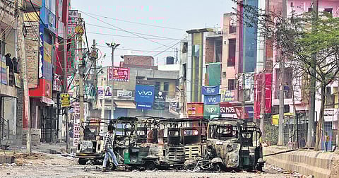 Charred vehicles and burnt down shops prove to be a chilling reminder of the violence that rocked multiple neighbourhoods in northeast Delhi. (Photo | EPS)