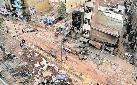 A deserted street in a riot-hit locality in northeast Delhi. (Photo | EPS)